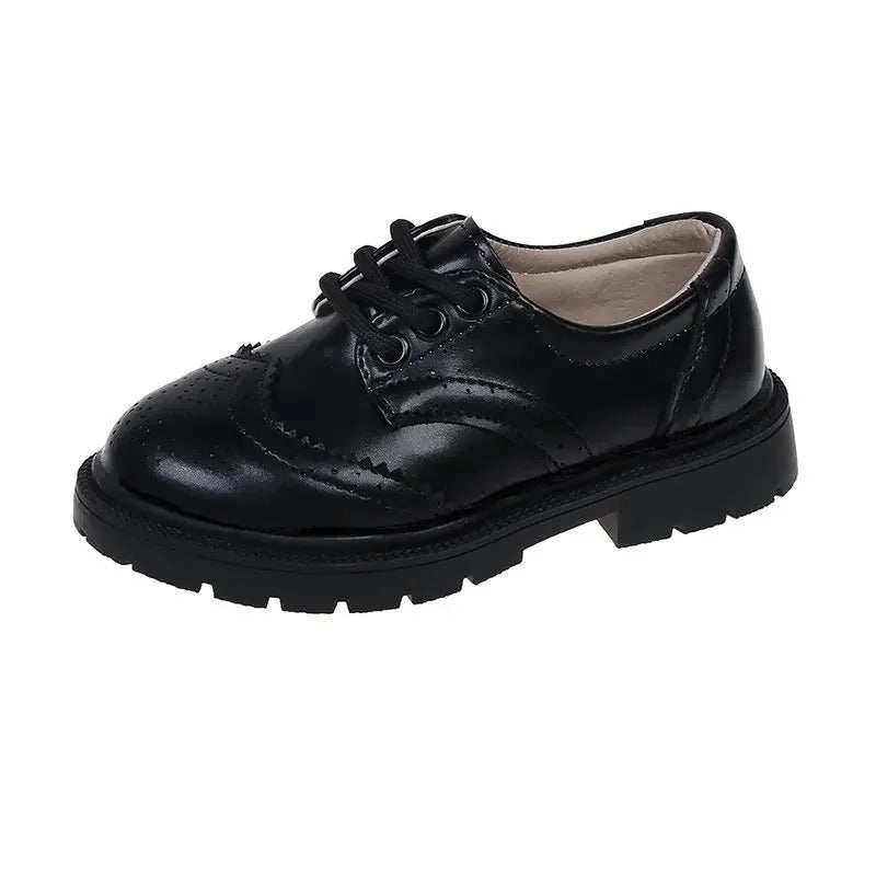 Finsnörda svarta loafers för pojkar