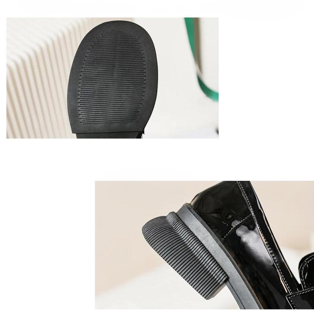Svarta lackloafers i syntetiskt läder för dam
