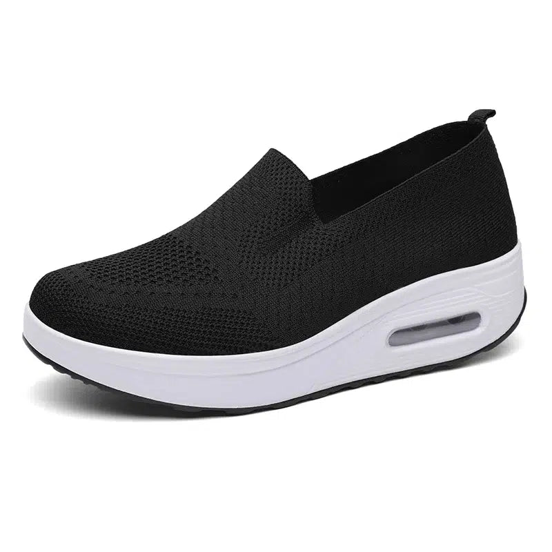 Mjuka andningsbara svarta loafers i tyg för damer