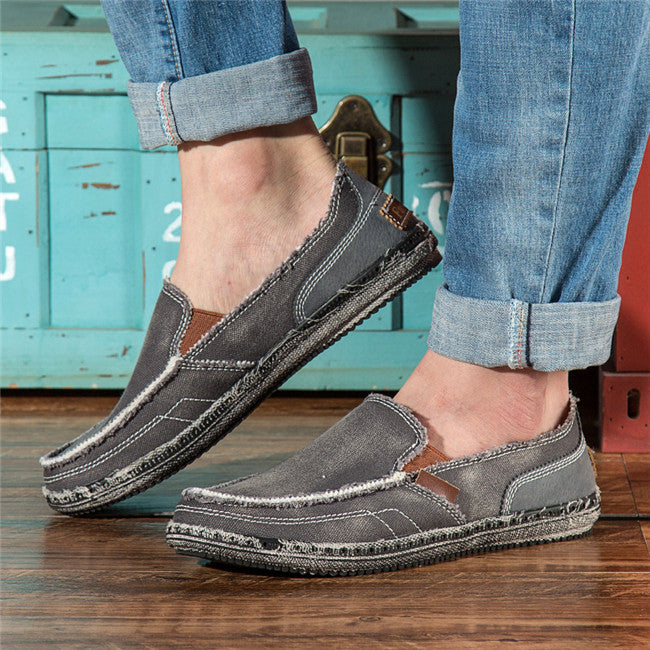 Avslappnade grå loafers i jeanstyg för herr