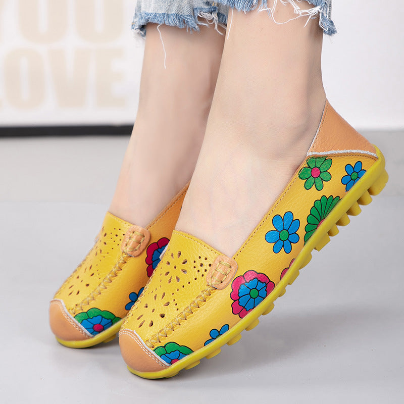 Gula loafers i läder med blommönster för dam