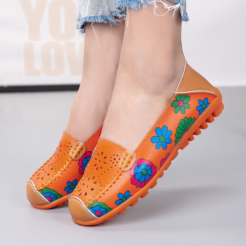 Orange loafers i läder med blommönster för dam
