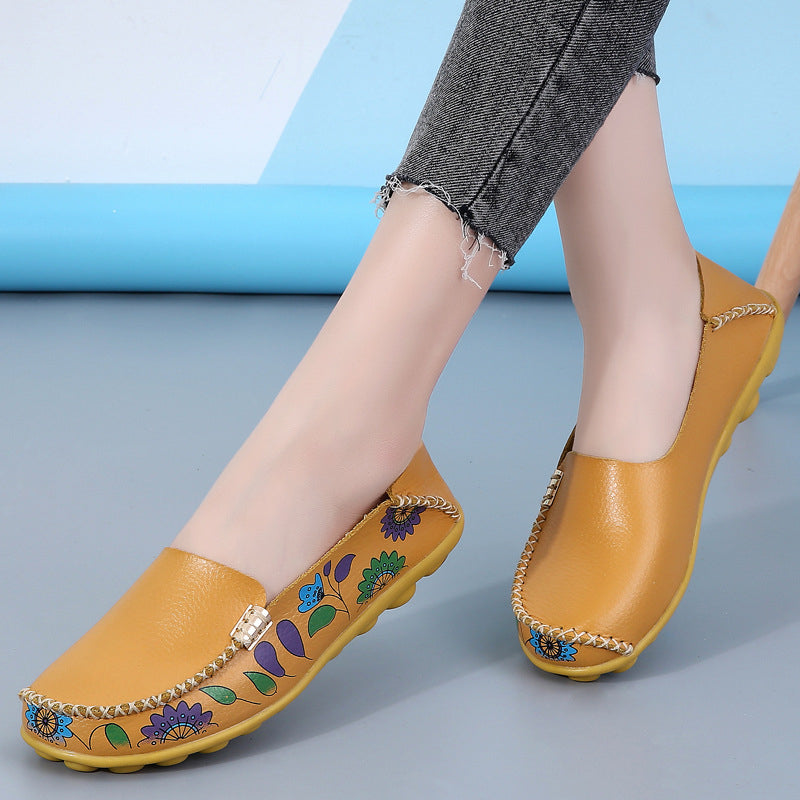 Orange loafers i läder med blommönster för kvinnor