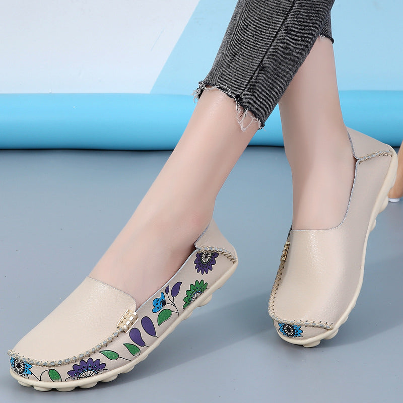 Beige loafers i läder med blommönster för kvinnor