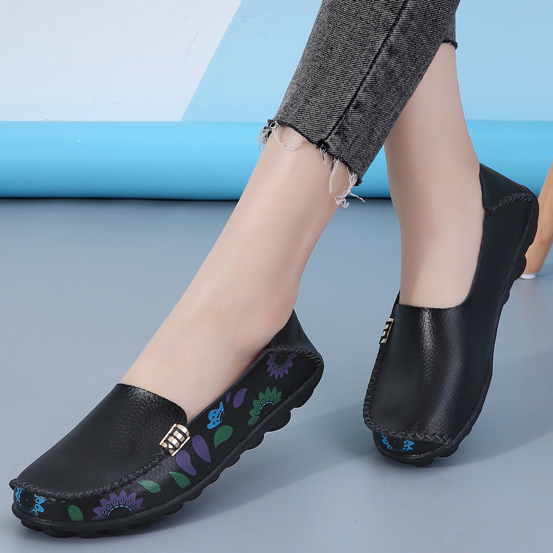 Svarta loafers i läder med blommönster för kvinnor