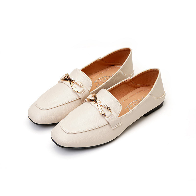Eleganta vita loafers med guldrosett för dam