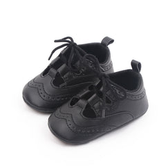 Genombruten loafer med snörning i sneakerstil för babyflicka, Svart