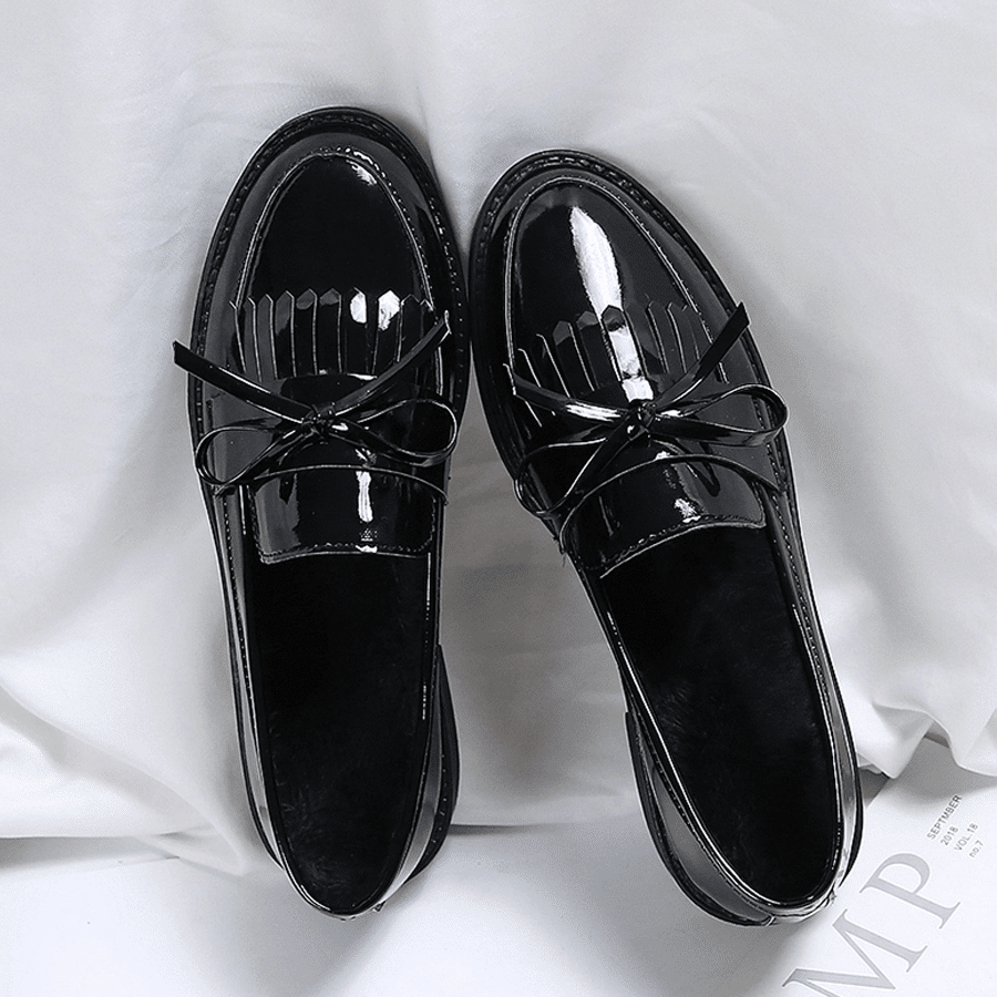 Svarta loafers i syntetläder med rosett för kvinnor