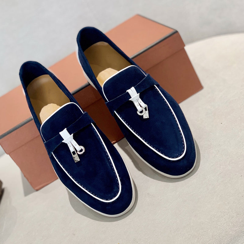 Herrloafers med tofs, eleganta detaljer och orange botten