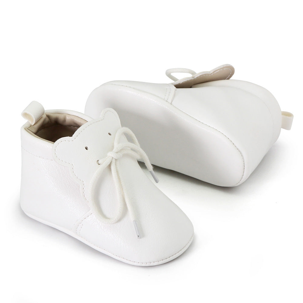Mjuka loafers med snörning och björntungsdetalj för baby, bild 6 av 9