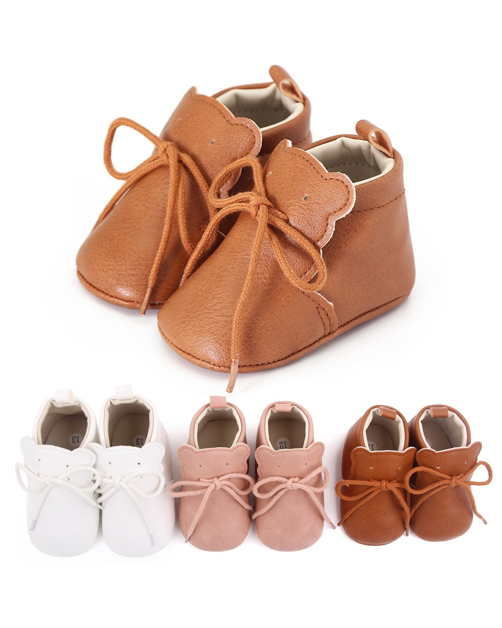 Mjuka babyloafers i läder med snörning och björnöron, i fyra färger Bild