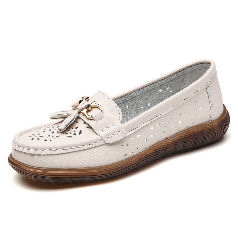 Beige loafers med tofsar att dra på för dam