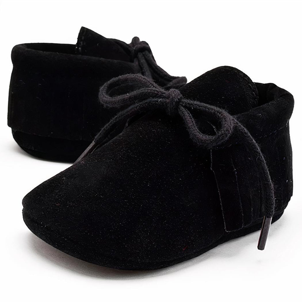 Svarta babyloafers med snörning och fransar