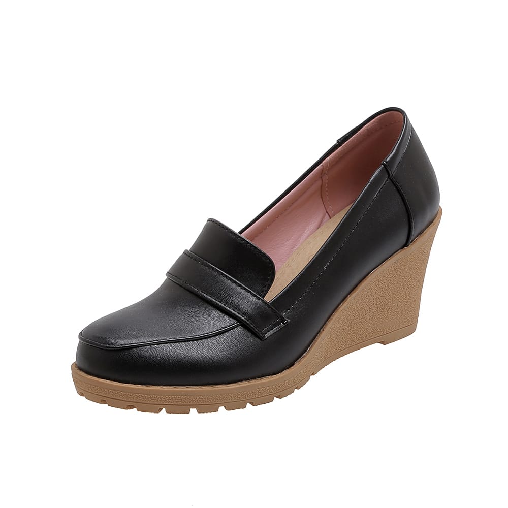 Svarta loafers med kilklack för dam
