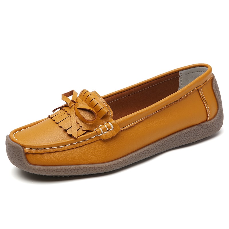 Gula loafers i äkta läder med fransar och rosett
