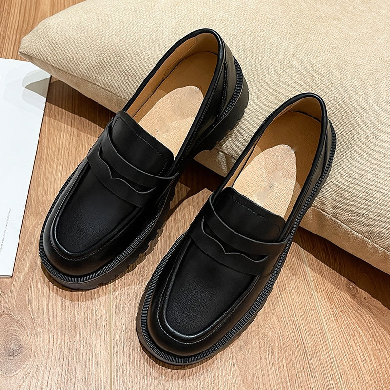 Svarta loafers i äkta läder med plattform för dam