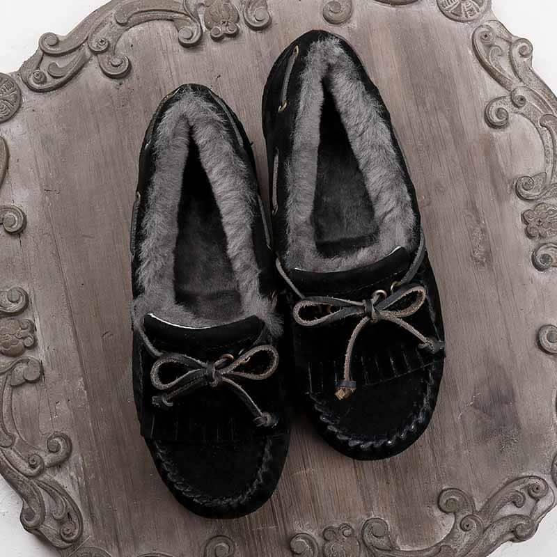 Fodrade svarta mockasinloafers med rosett för damer
