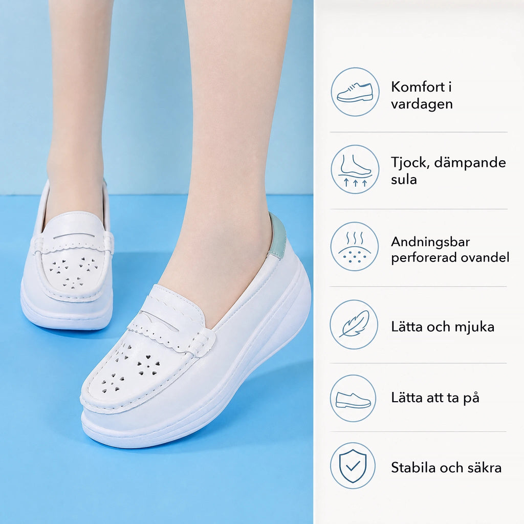Vit perforerad damlofer i läder med kilsula, sidovy