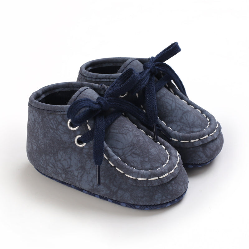 Höga blå loafers med snörning i krackelerat material för babypojke