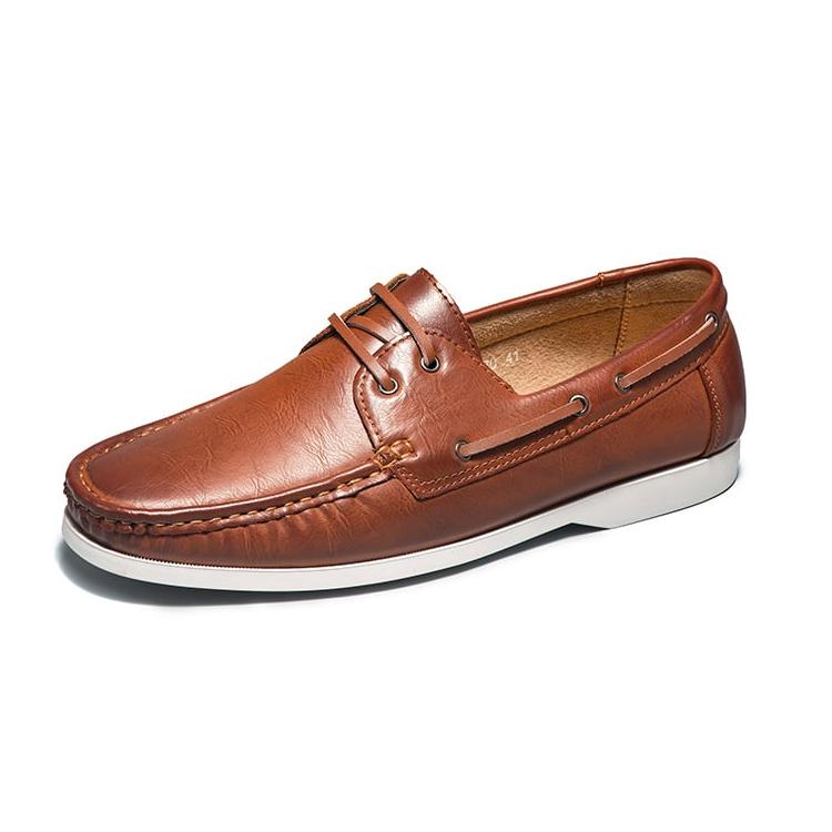 Foto av en brun loafer i läder med snörning