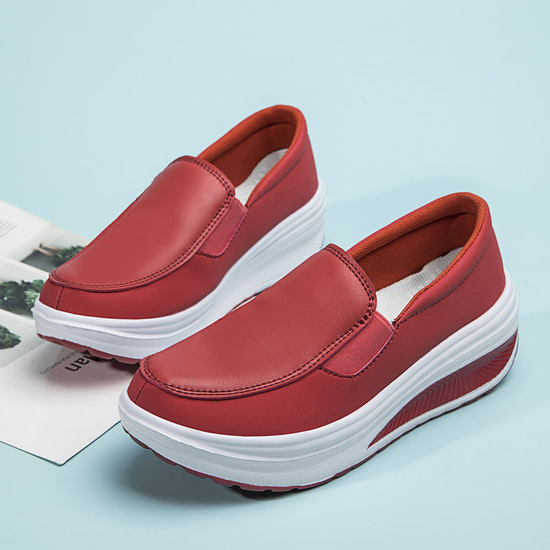 Ortopediska röda loafers i läder med platå