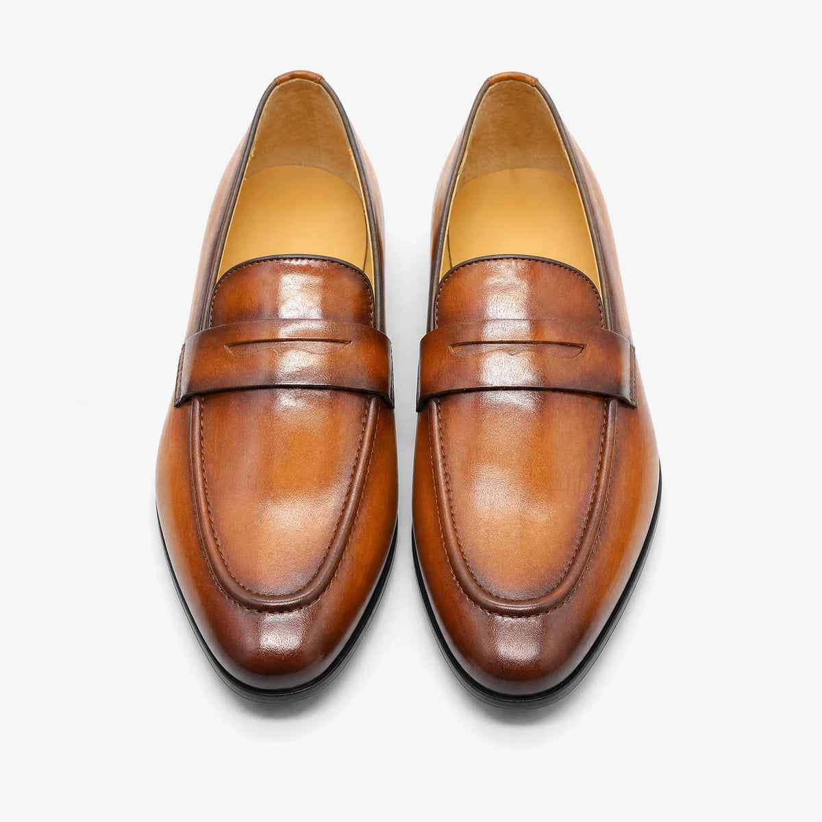 Penny loafers herr i handpatinerat mörkbrunt läder