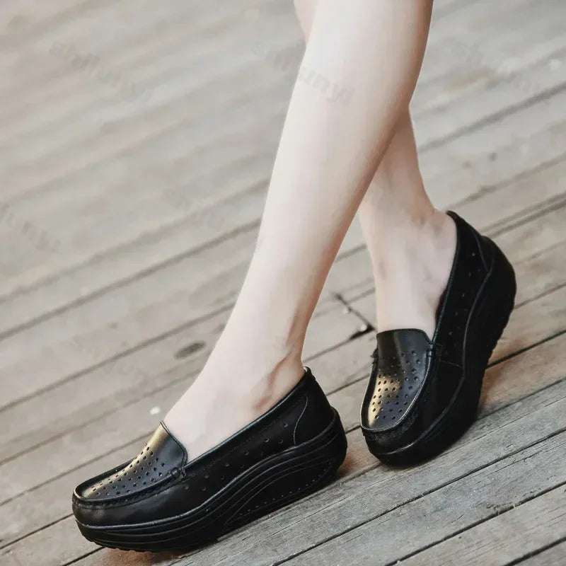 Vita perforerade loafers