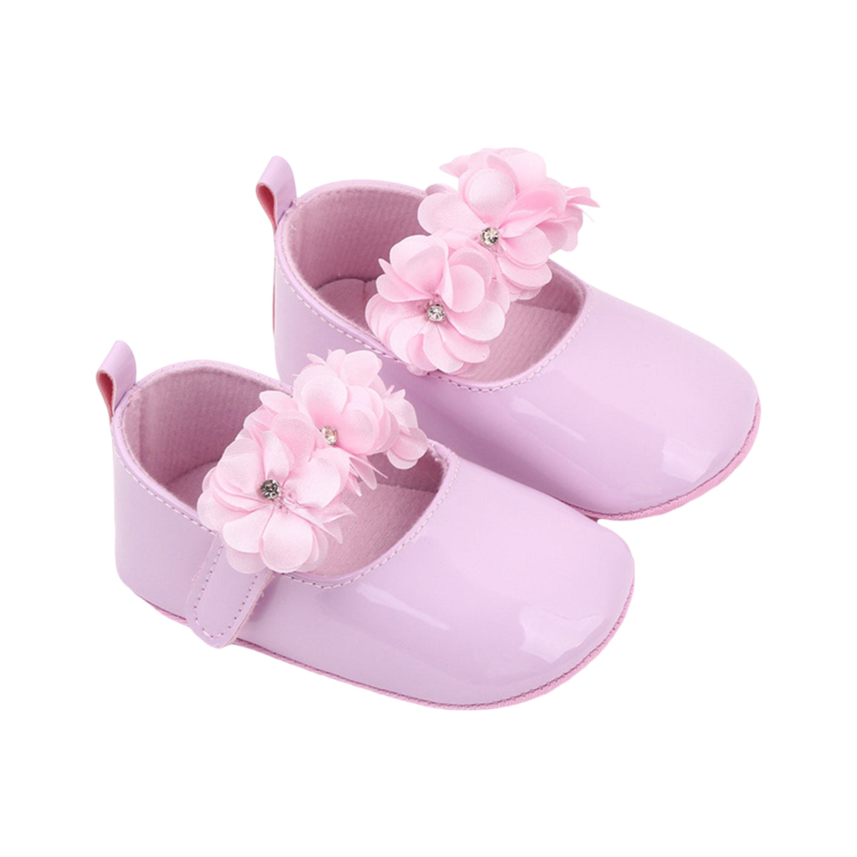 Söta rosa blomstermockasiner för babyflicka