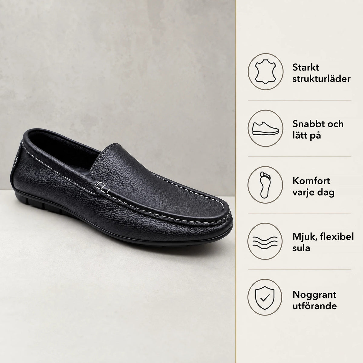 Svarta slip-on loafers för herr med vita kontrastsömmar närbild på detaljerna